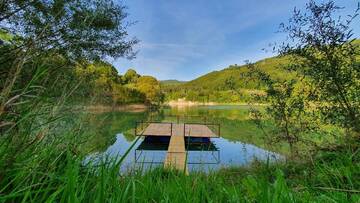 Фото Дома для отпуска Cabana Lac Paltinu si Padure Valea Doftanei г. Teşila 1